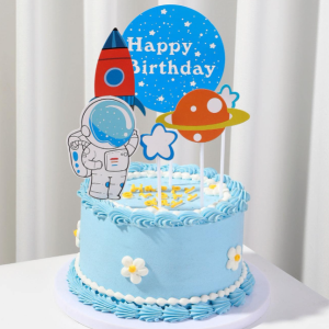 Decoración tarta astronauta y planeta